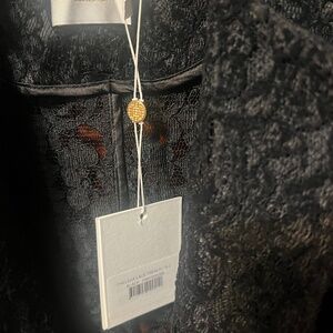 Lace trenchcoat by Misha collection